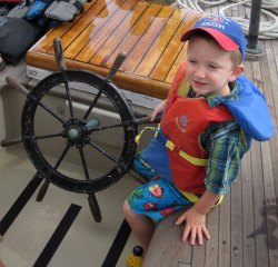 Mason at the helm